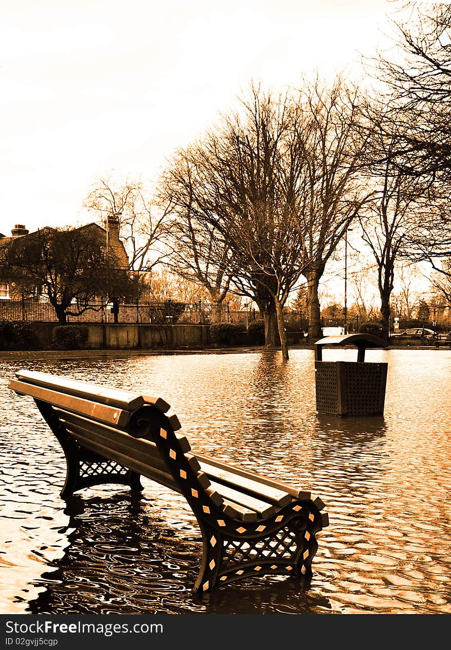 Flooded park by the thames river. Flooded park by the thames river