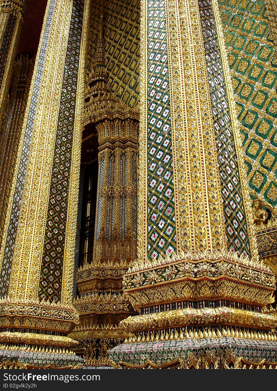 Golden pillars in a buddhist temple, Bangkok, Thailand. Golden pillars in a buddhist temple, Bangkok, Thailand