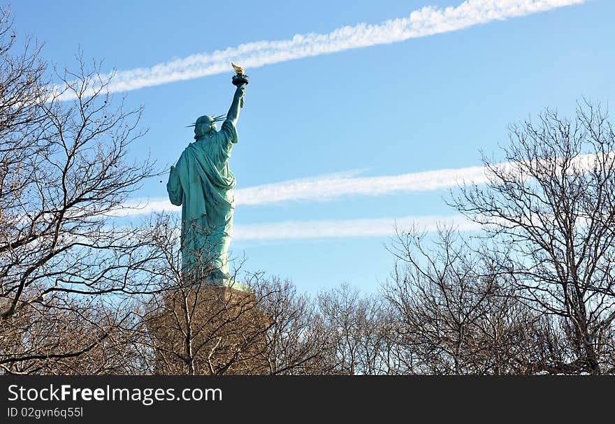 Statue of Liberty seen from the rear, New-york City, NY, USA. Statue of Liberty seen from the rear, New-york City, NY, USA