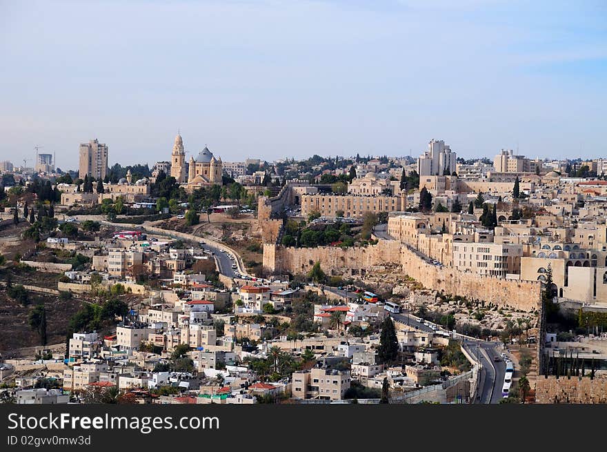 Jerusalem mountain range Moriah with antique fortress and church the Apostle Peter and singing the cock