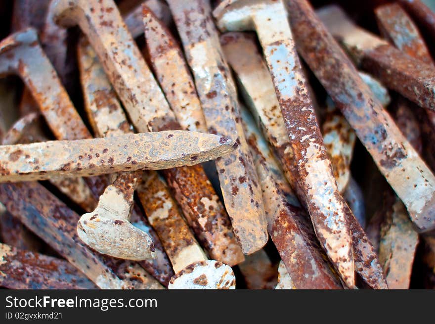 Rusty Pile Of Railroad Spikes