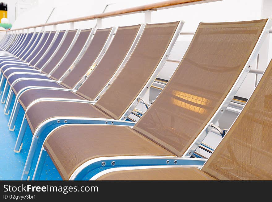 Deck chairs on the cruise ship deck. Deck chairs on the cruise ship deck.