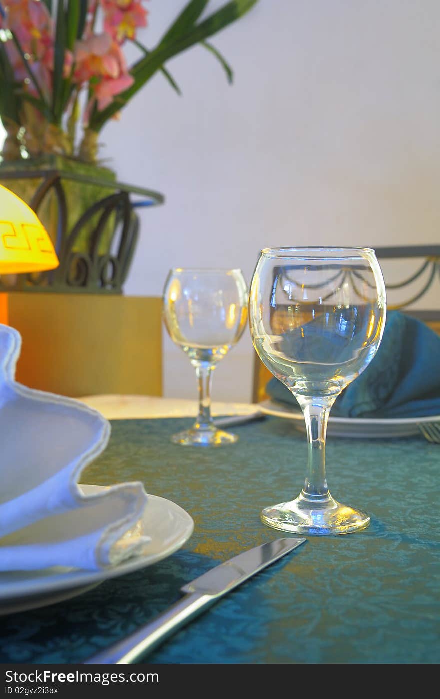 Empty glass on the table at the cafe. Empty glass on the table at the cafe.