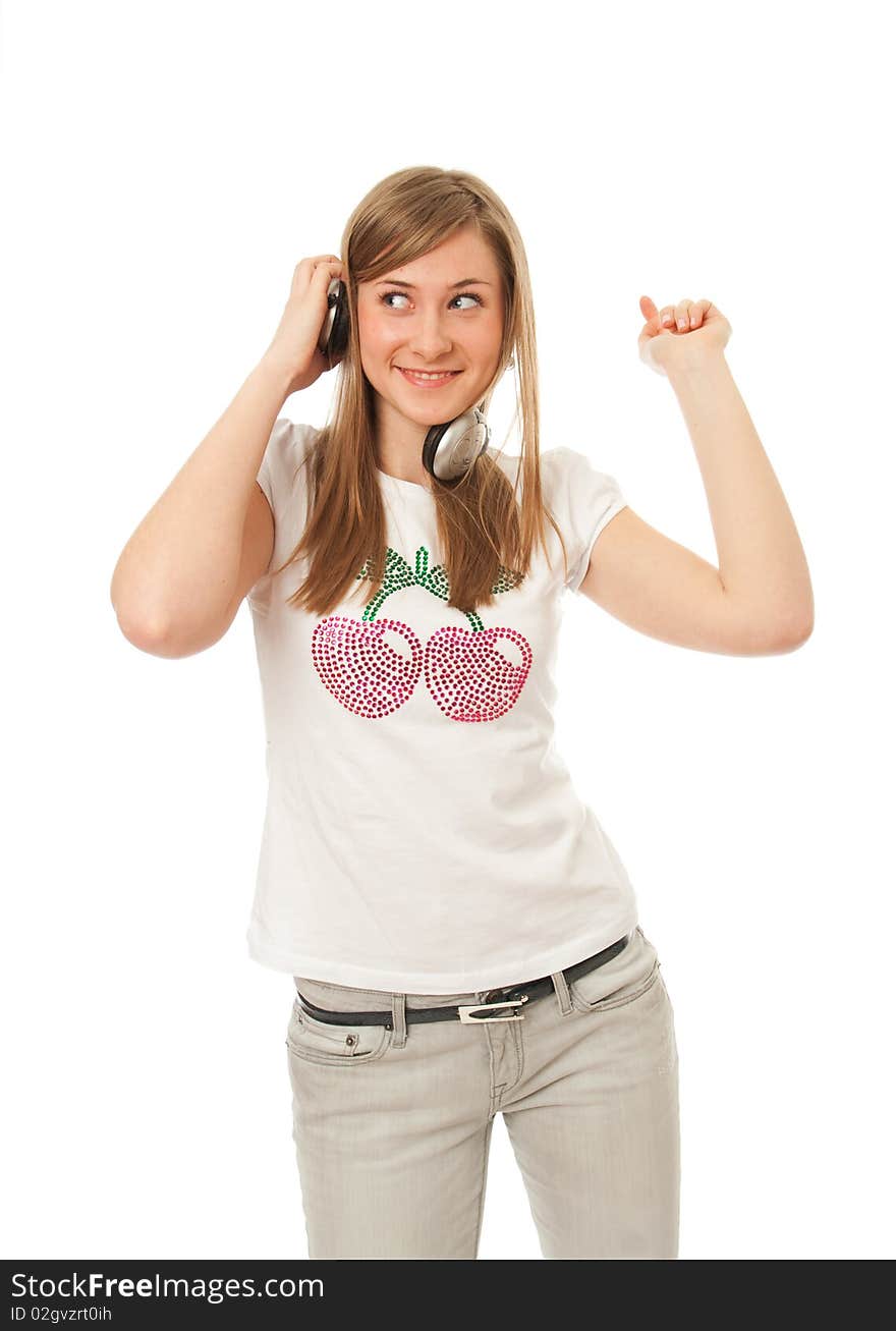 The young beautiful girl with headphones isolated on a white background