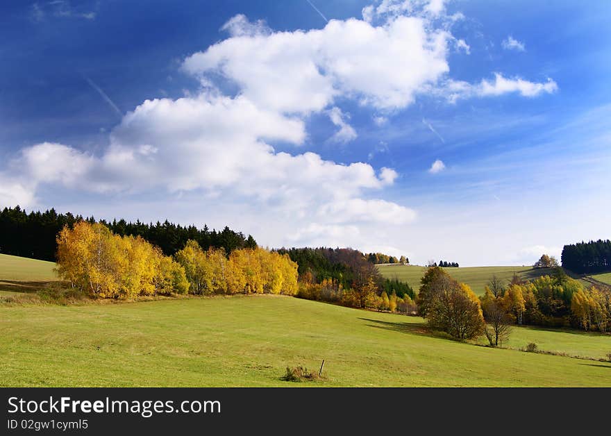 Autumny scenery with white clouds. Autumny scenery with white clouds