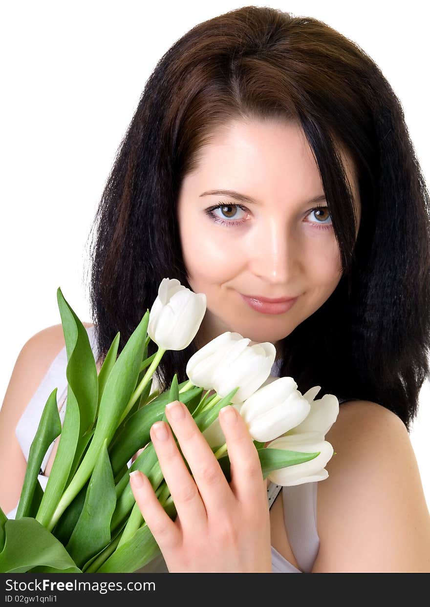 Attractive woman with white tulips