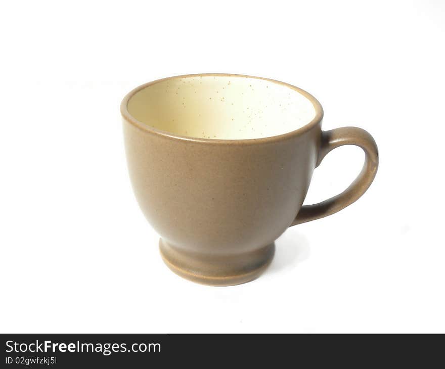 Brown mug for coffee or tea isolated on a white background