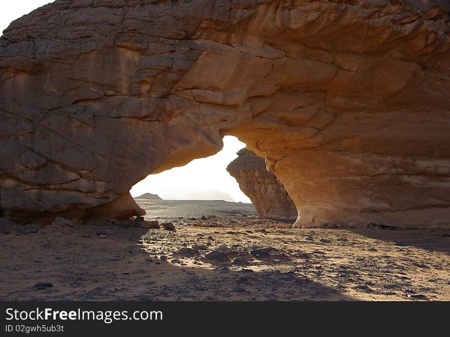 An arch in the desert of Libya, in Africa. An arch in the desert of Libya, in Africa