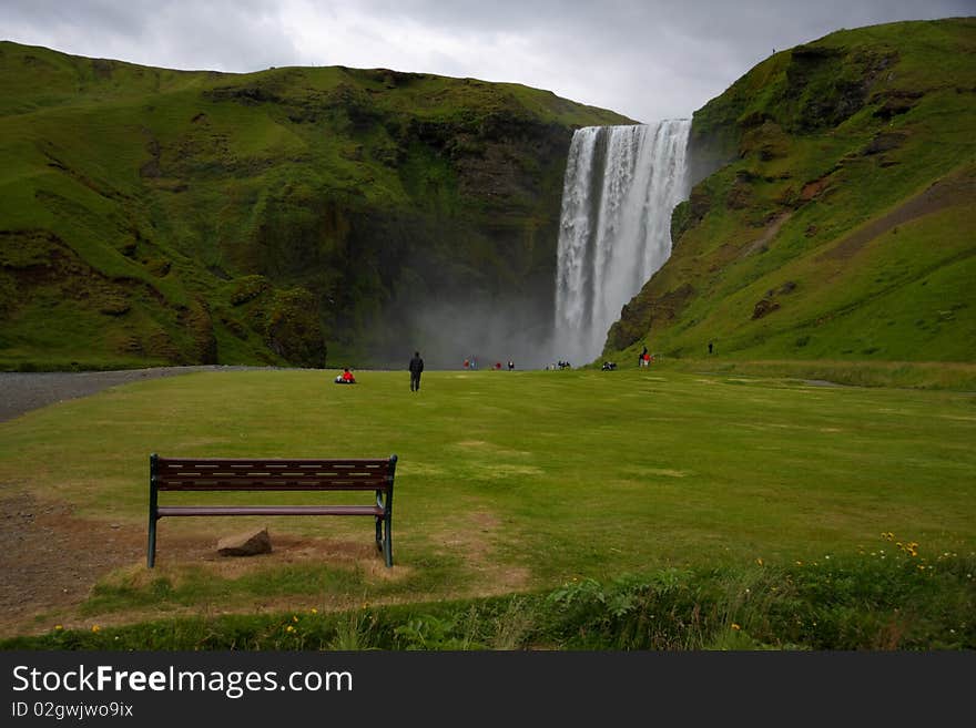 Sitting near the waterfall