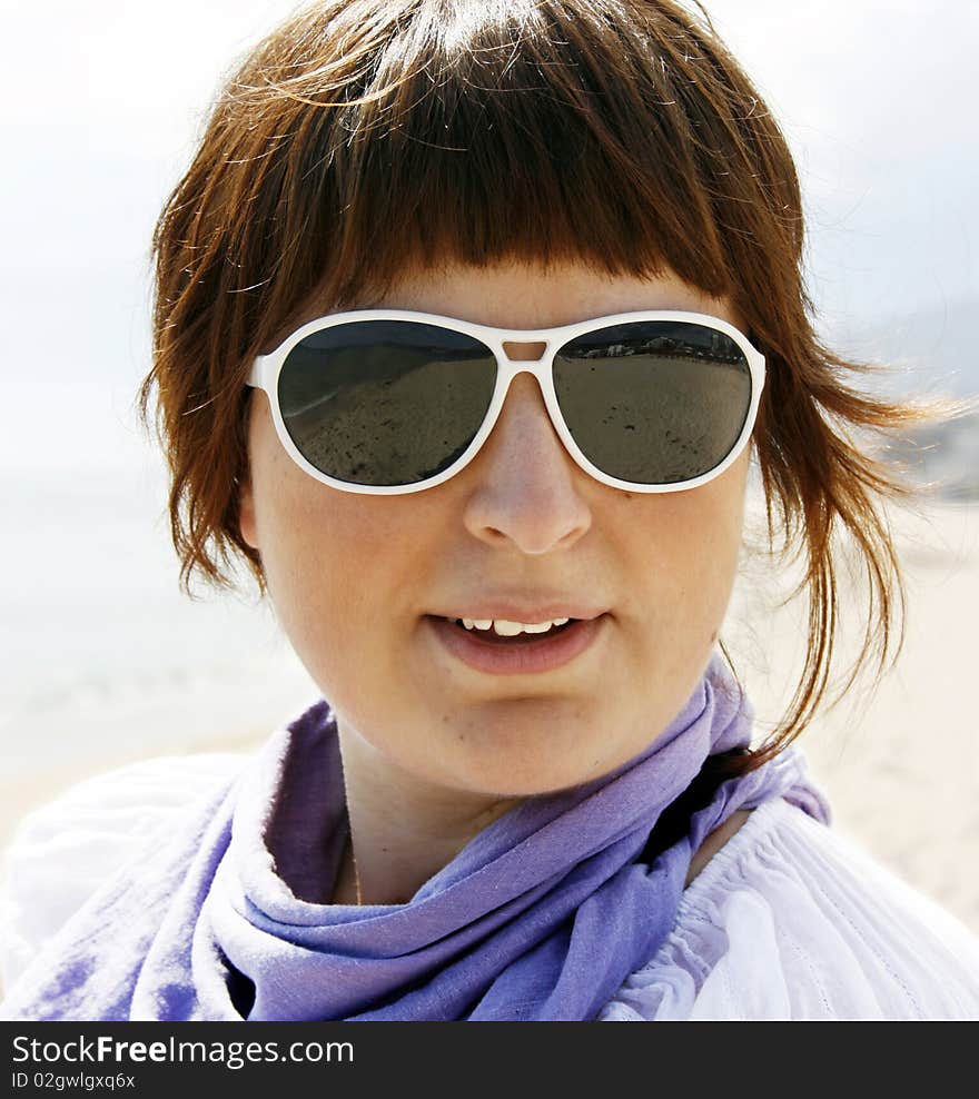 Beautiful young woman on the beach