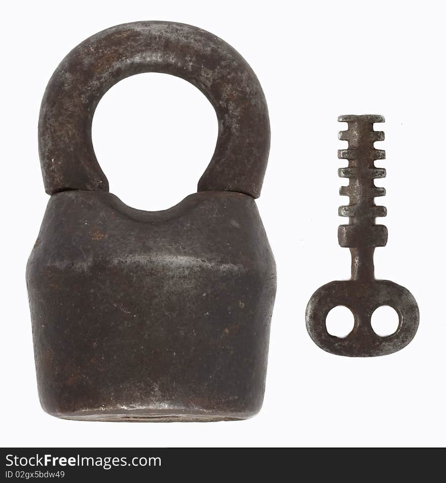 Old cast iron barn padlock with key