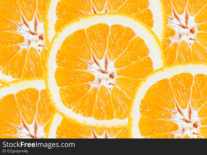 Close up of slices of fresh orange one over another