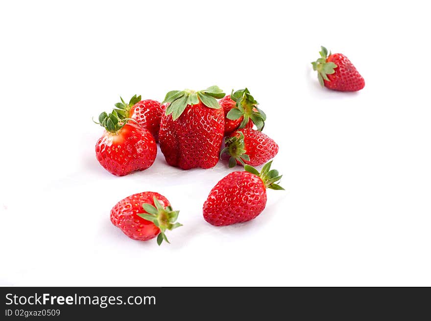 Heap of fresh and clean strawberries pn bright white background. Heap of fresh and clean strawberries pn bright white background