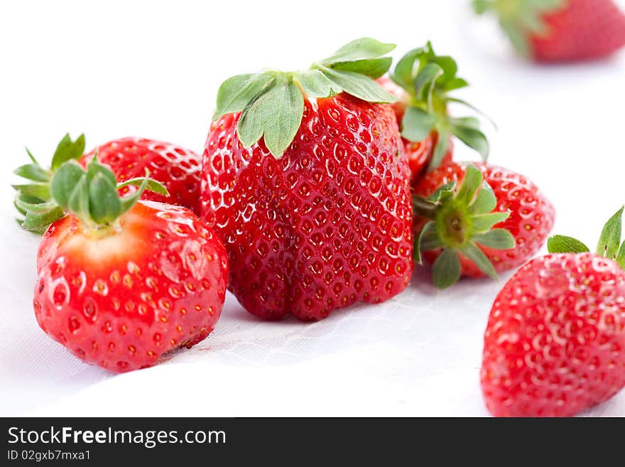 Heap of fresh and clean strawberries pn bright white background. Heap of fresh and clean strawberries pn bright white background