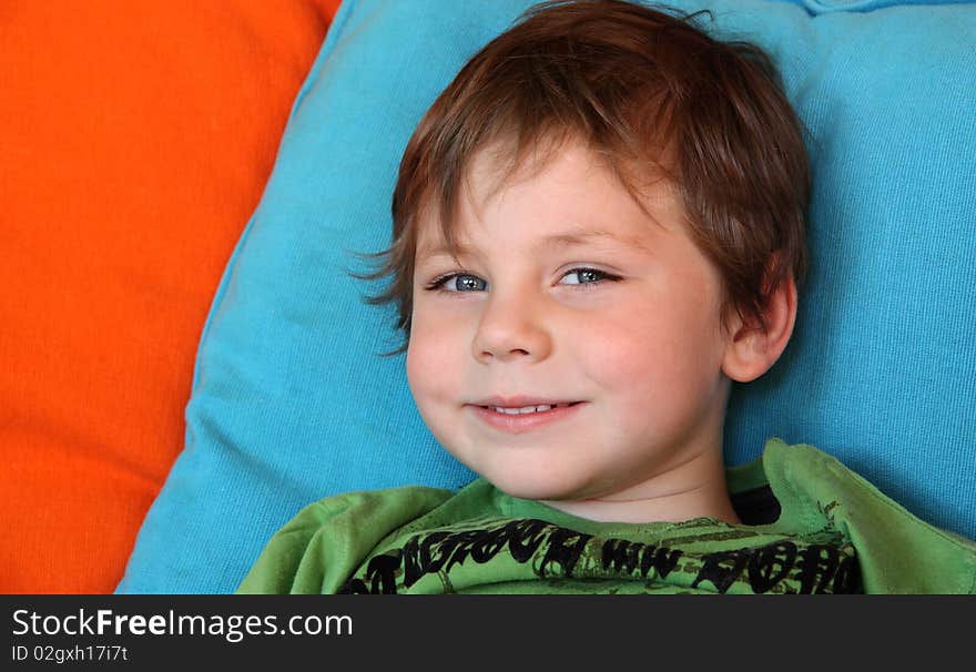 Cute five year old white boy on bright background. Cute five year old white boy on bright background