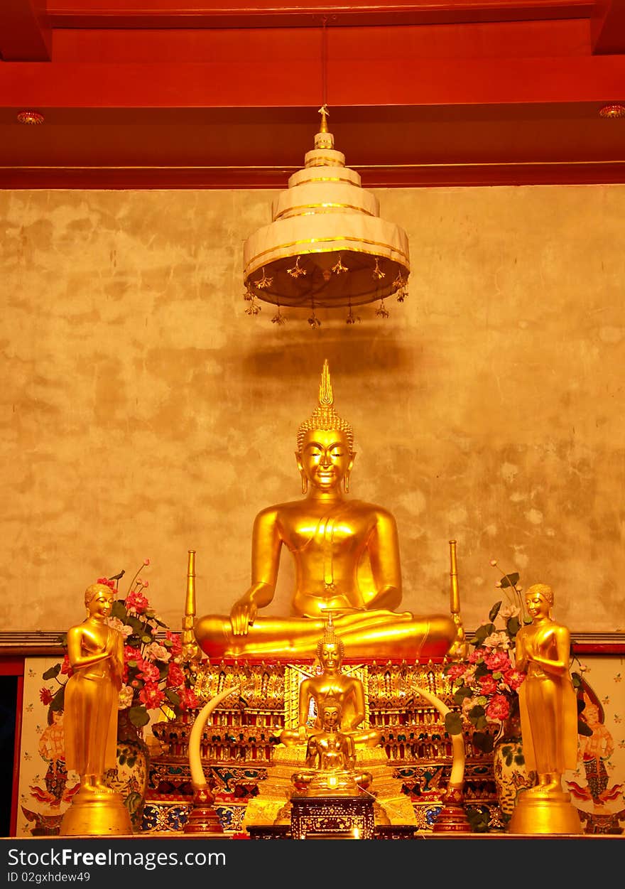 Buddha and monk in the Temple , Central in Thailand. Buddha and monk in the Temple , Central in Thailand.