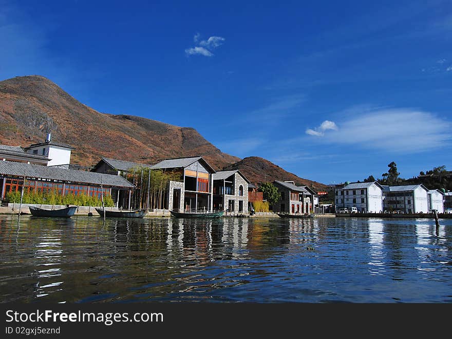 Chinase traditional folk houses standing beside erhai lake