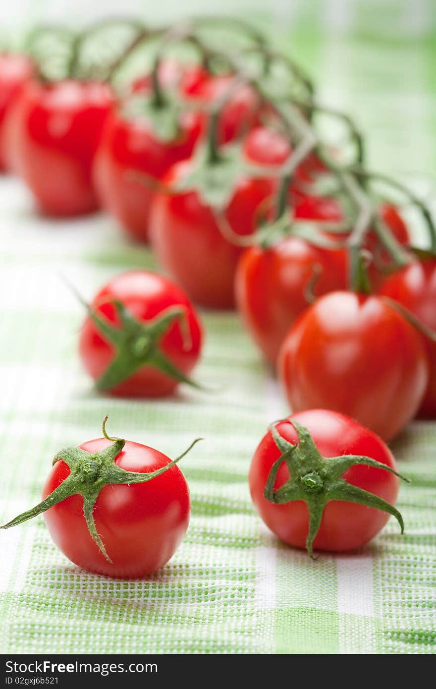 Ripe Tomatoes Over Green