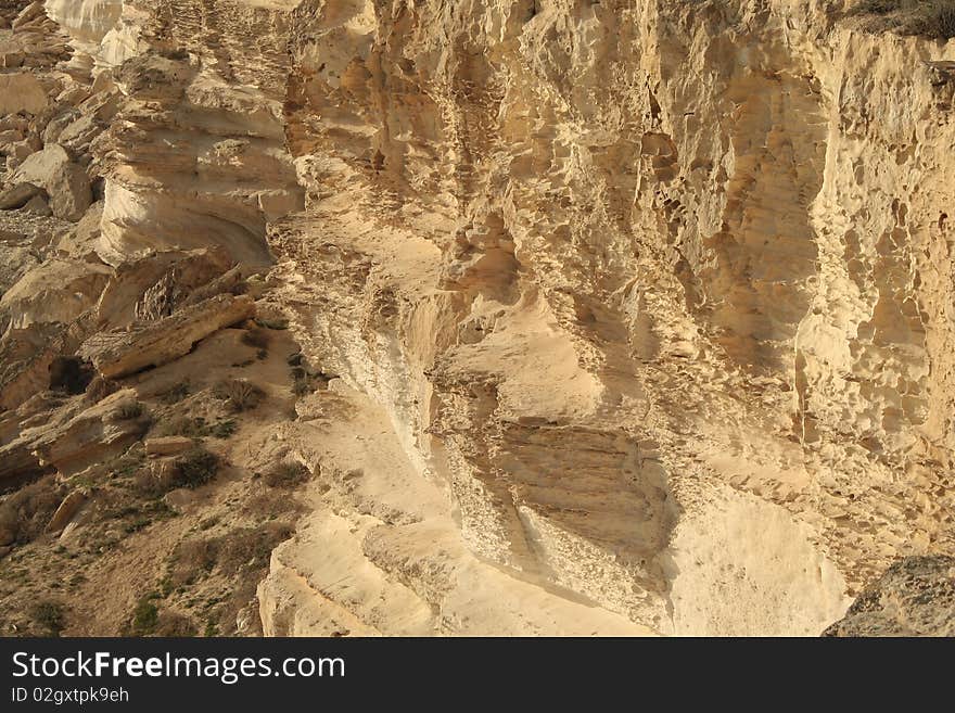 View of the cliff at the top. Close-up. Evening. View of the cliff at the top. Close-up. Evening.