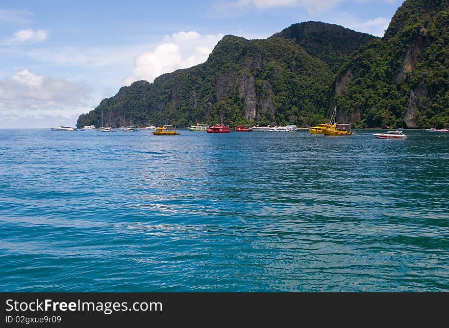 Boats on islands bay Phi Phi Thailand