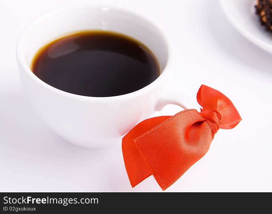 Coffee Cup With A Red Bow