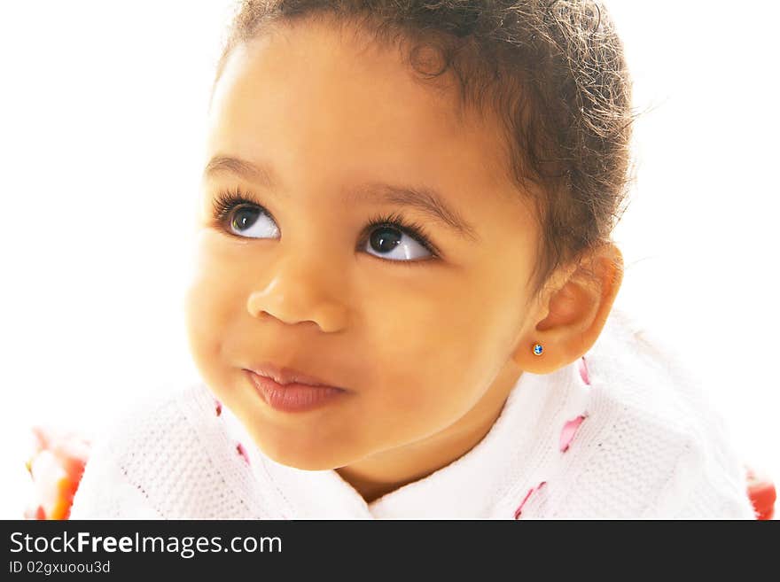 Close-up portrait of a pretty little girl