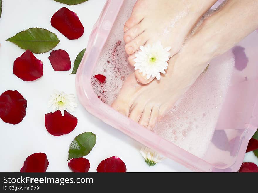 Massage of parts of a body in an aromatic bath. Massage of parts of a body in an aromatic bath