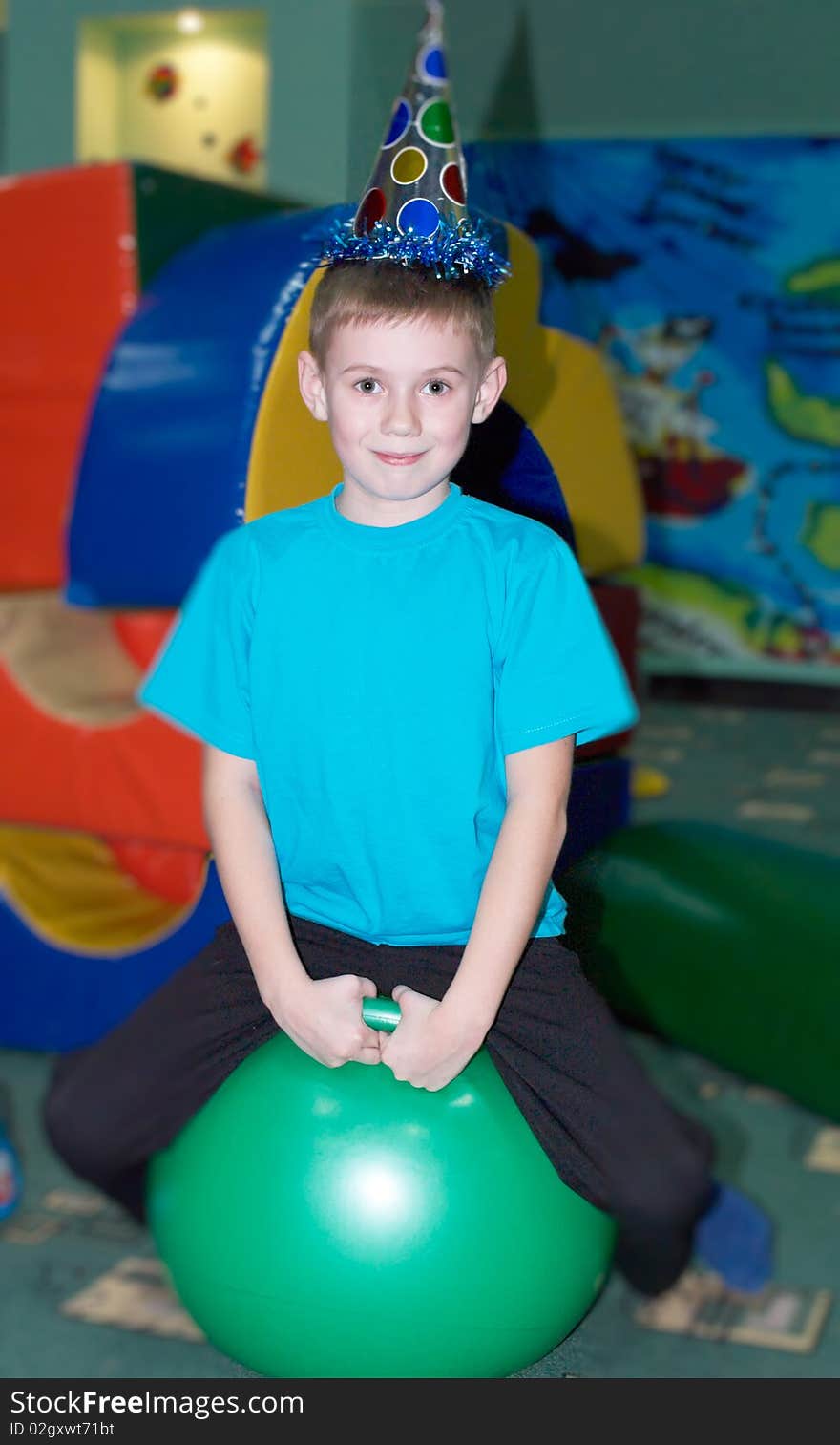 Portrait of the boy playing to a children's room