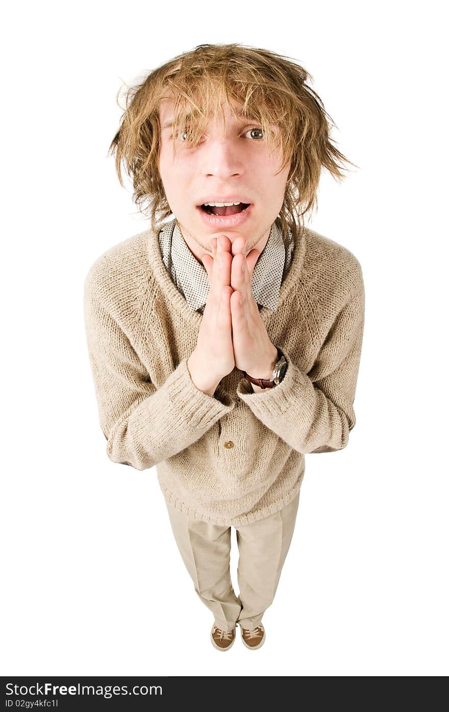 Unhappy young man isolated on white background. Fisheye lens.