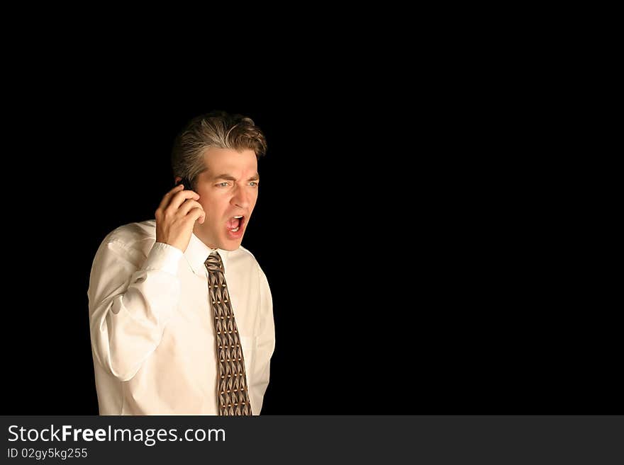 Business man yelling on cell phone