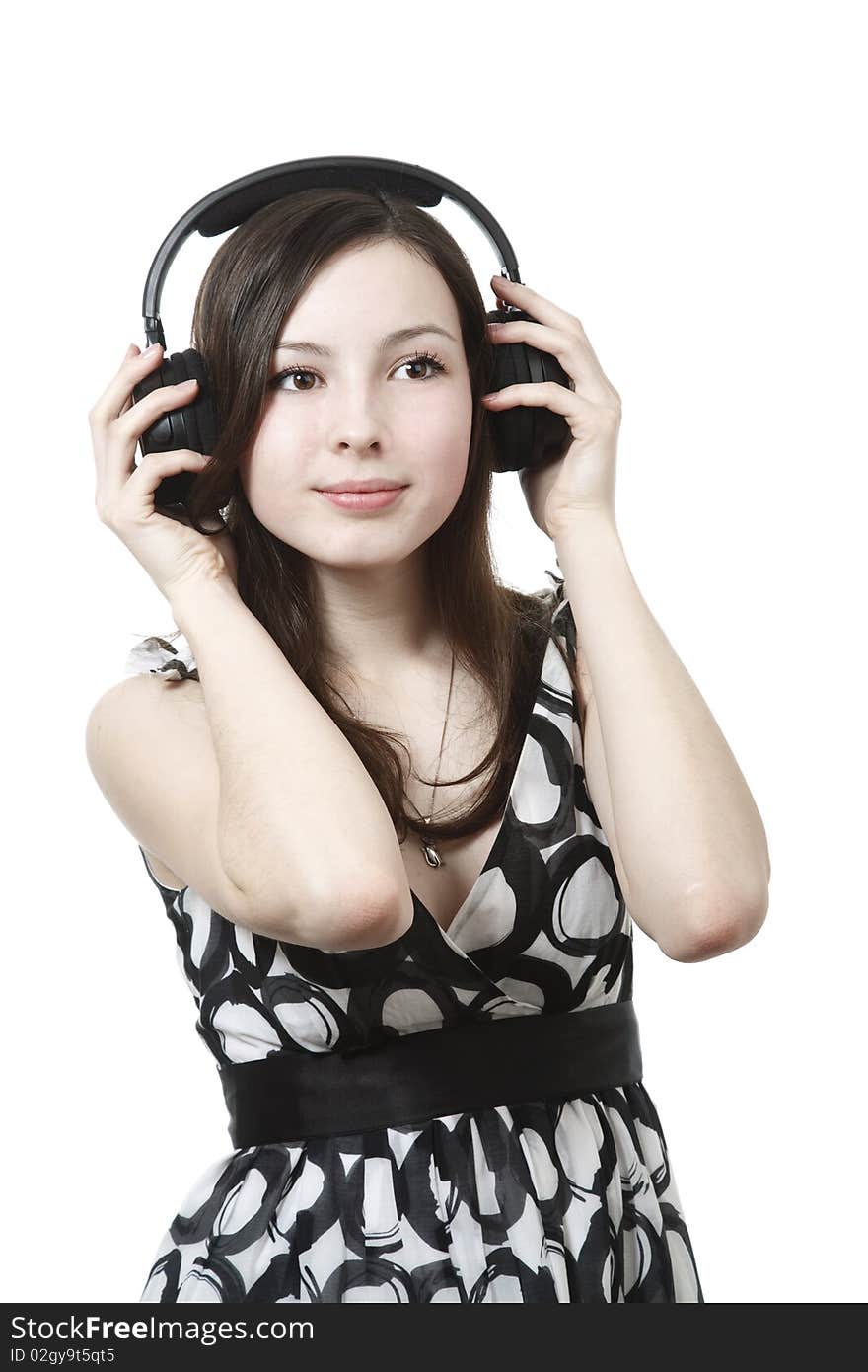 Girl with headphones isolated on white