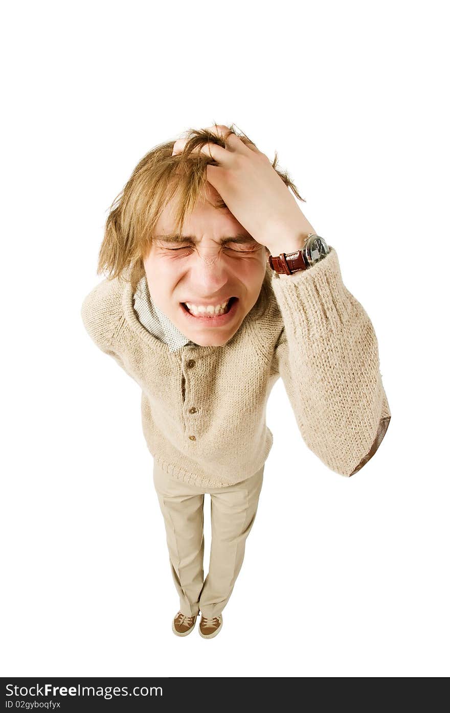 Unhappy young man isolated on white background. Fisheye lens.