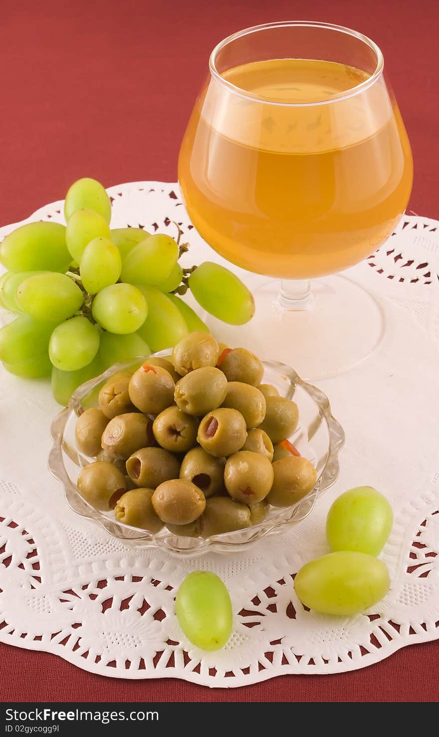 Fresh grapes and cheese with white mold, white wine