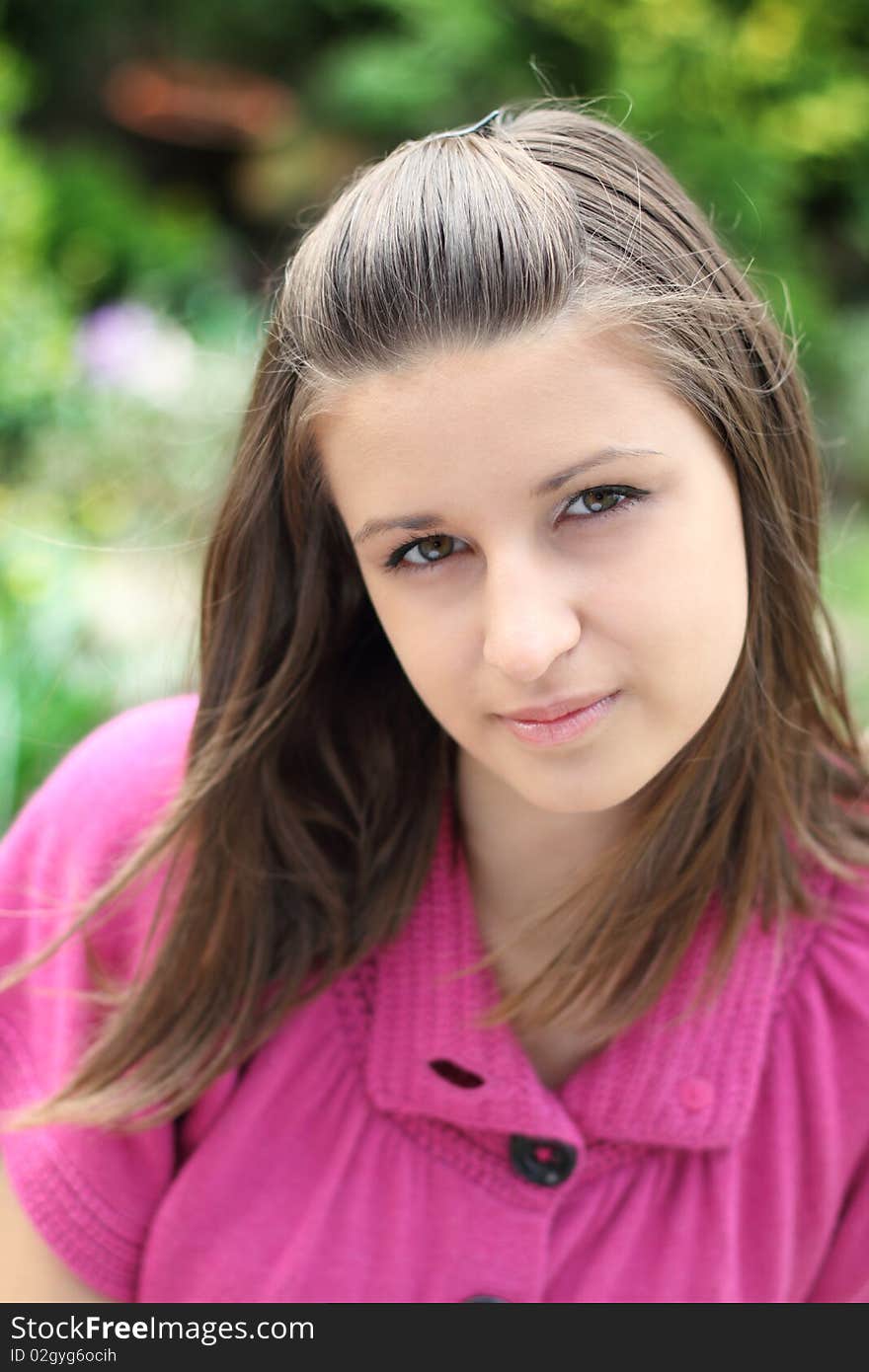 Portrait of a girl in the pink jacket