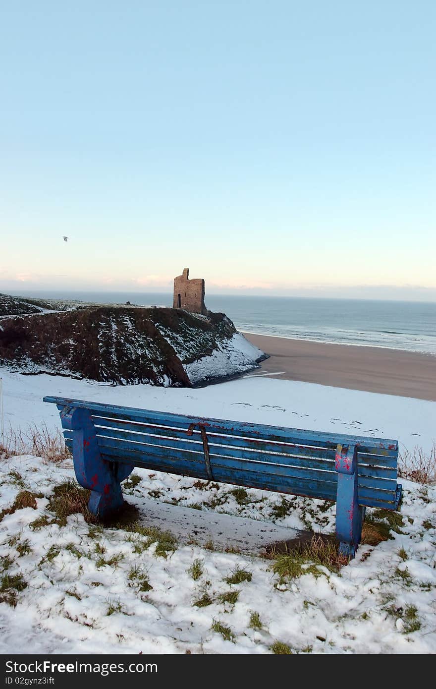 Ballybunion bench in winter with view of castle beach and cliffs. Ballybunion bench in winter with view of castle beach and cliffs