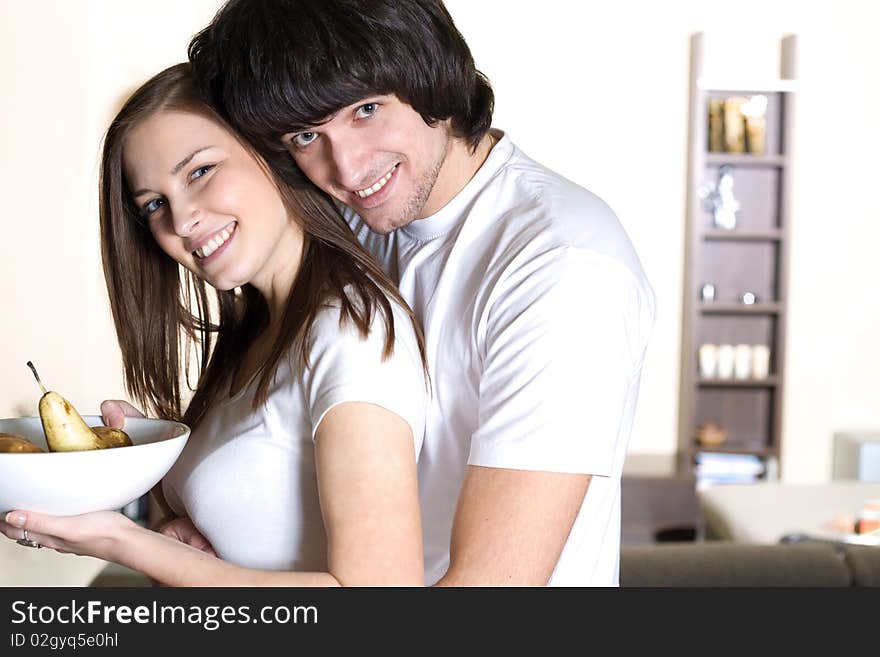 Boy and nice girl with plate