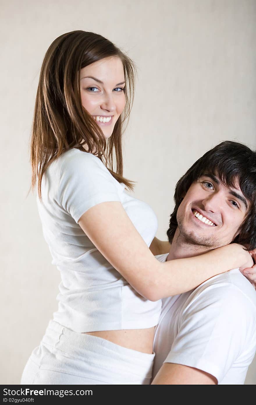 Boy with smile and girl in white t-shirt. Boy with smile and girl in white t-shirt