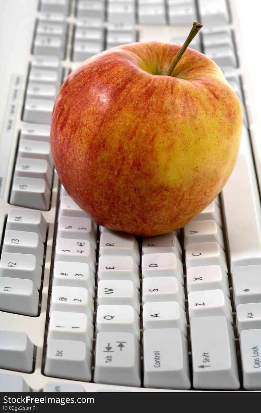 Traditional business concept. 
red apple on keyboard. Traditional business concept. 
red apple on keyboard