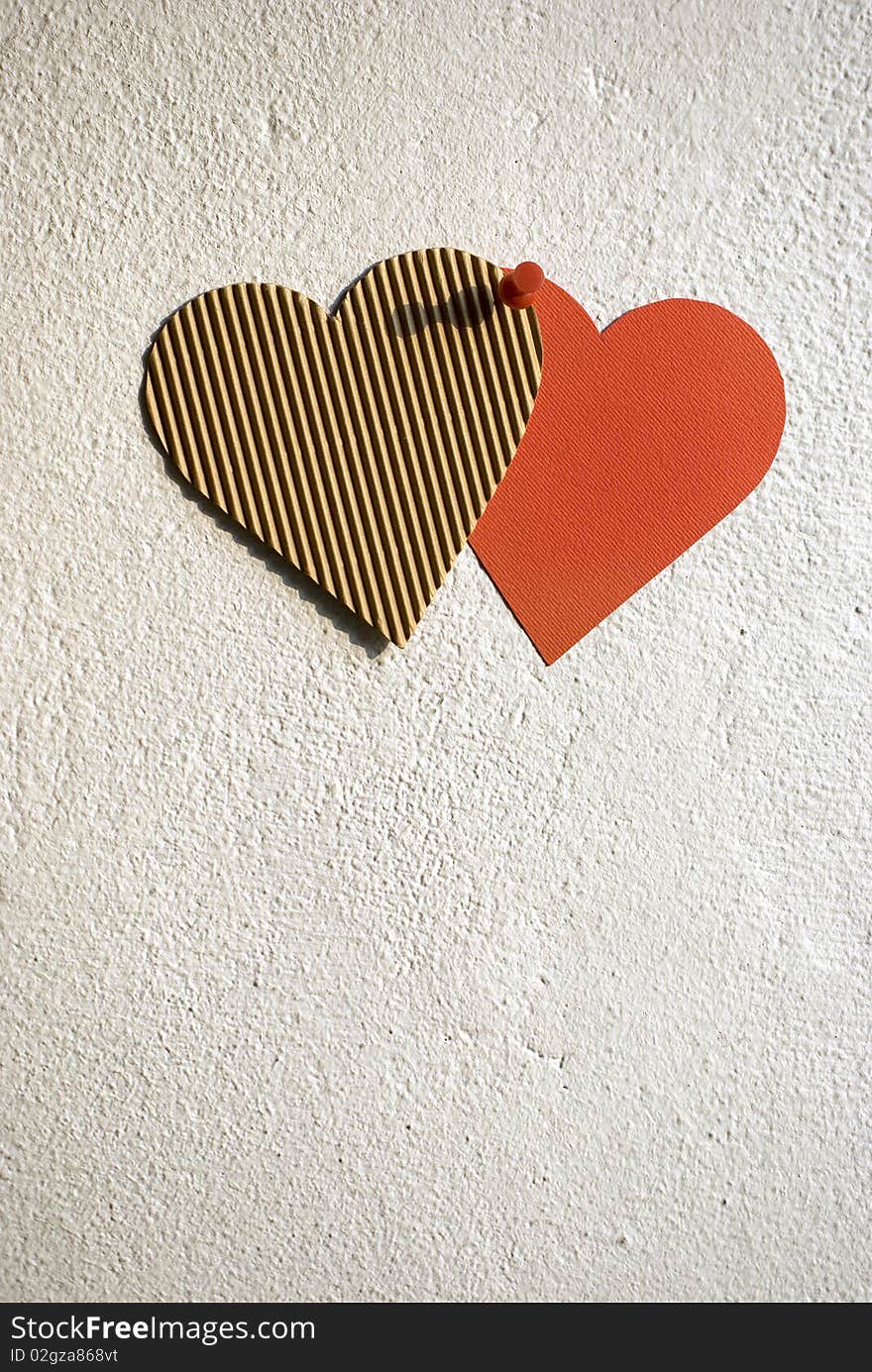 Paper hearts pinned on the wall