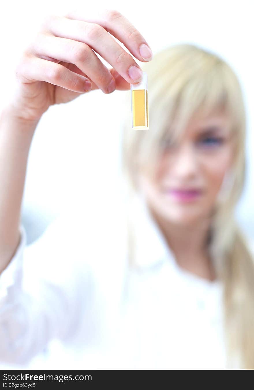 Closeup of a female researcher carrying out experiments in a lab