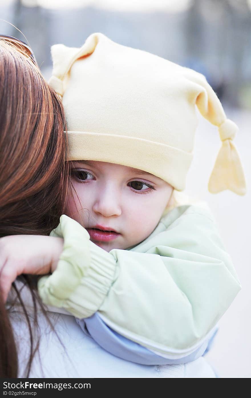 Mother holds little girl on hands. Mother holds little girl on hands