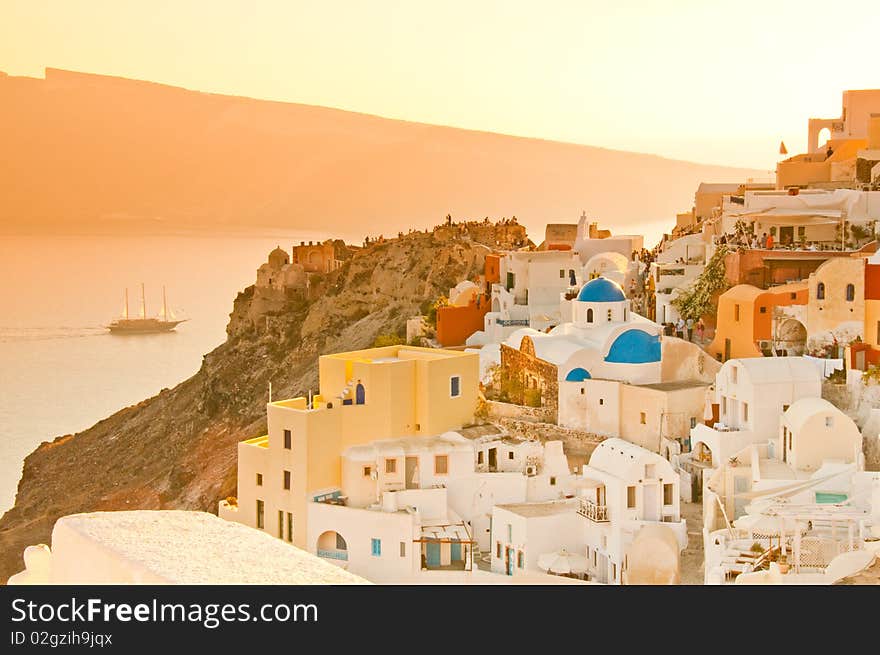 Greek church in santorini greece with a cross