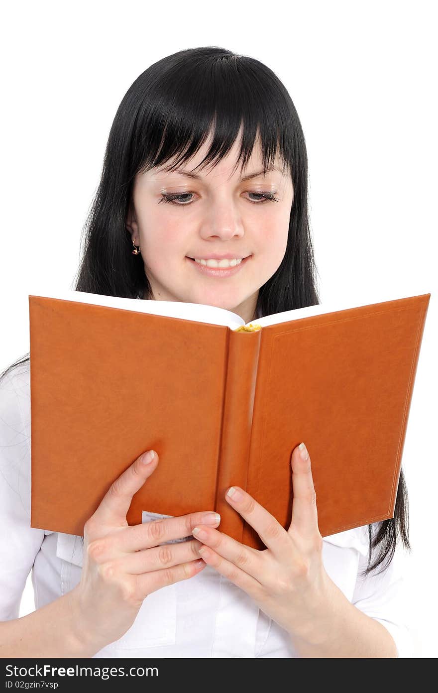 Portrait of the young woman reading the book on a white background. Portrait of the young woman reading the book on a white background