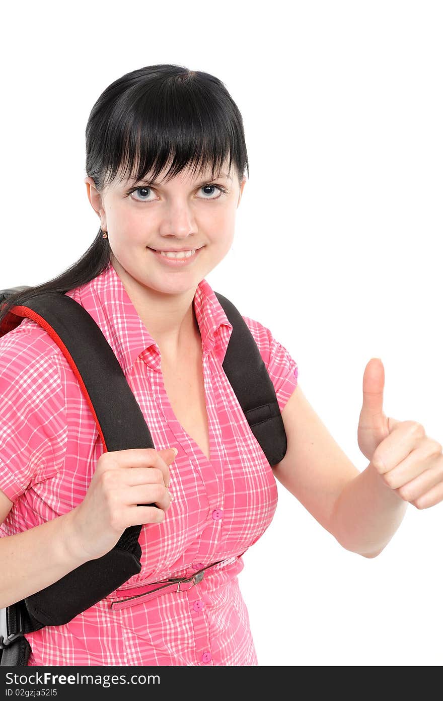 Young woman with thumbs ok; bears a backpack; isolated on a white background. Young woman with thumbs ok; bears a backpack; isolated on a white background