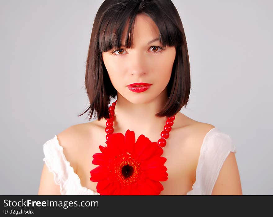 The young lady on the white background in studio