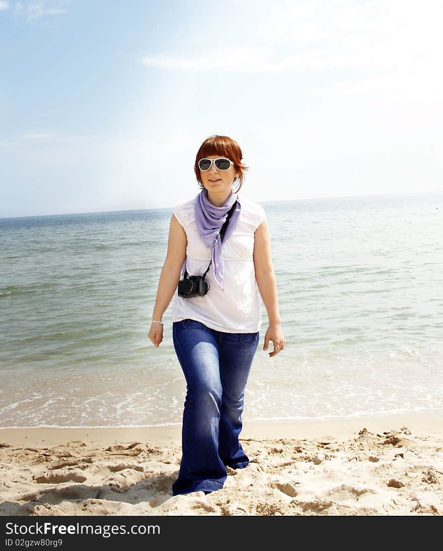 Young Woman On The Beach