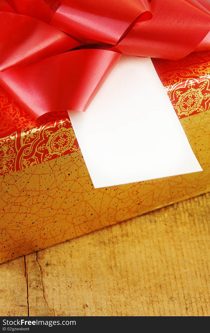 Present with Red Bow and Blank Gift Card