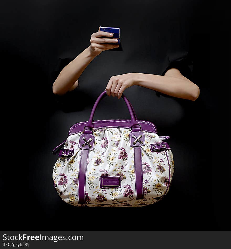 Hand with purse