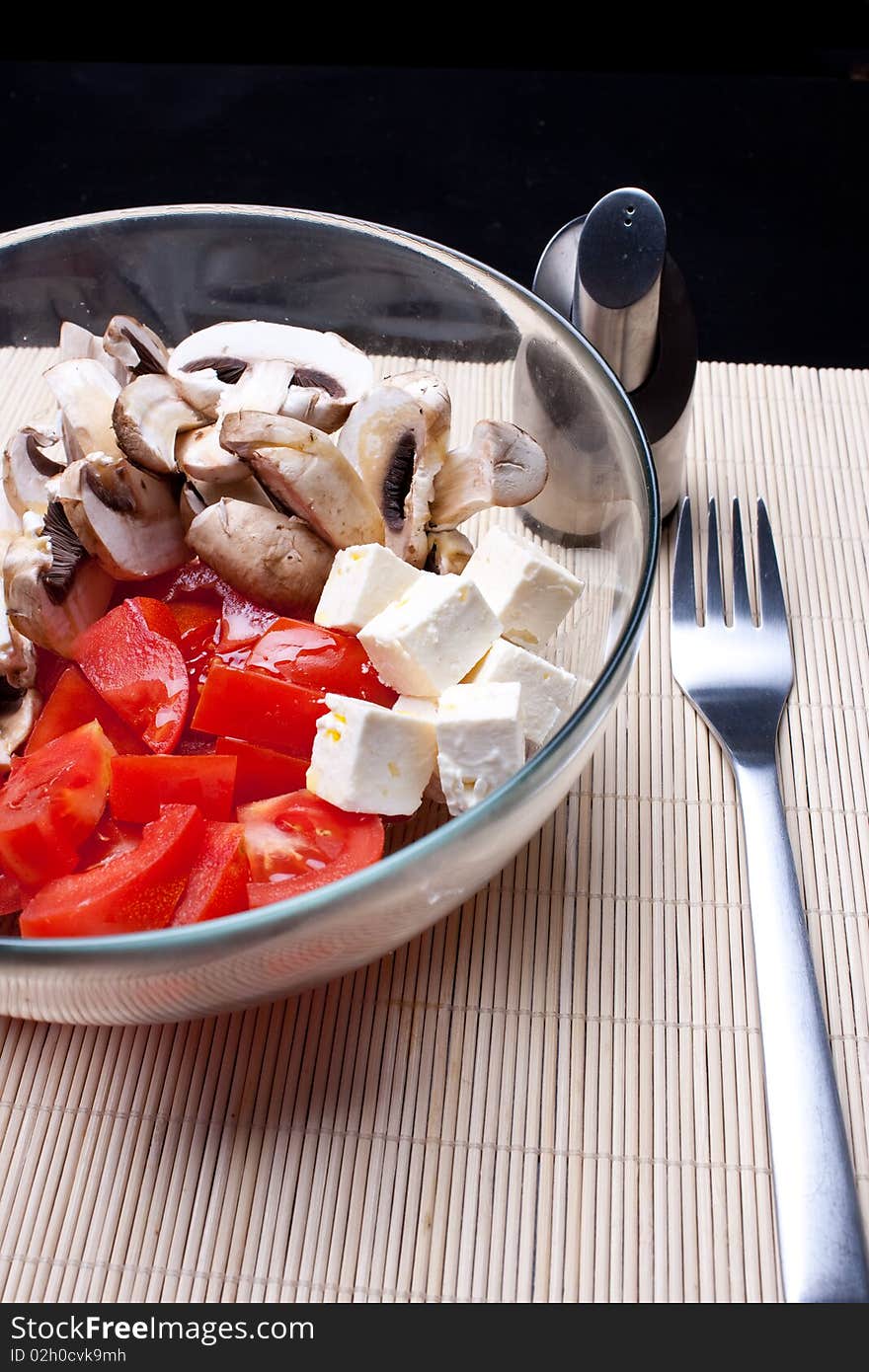 Italian salad with tomatoes, mushrooms and cheese