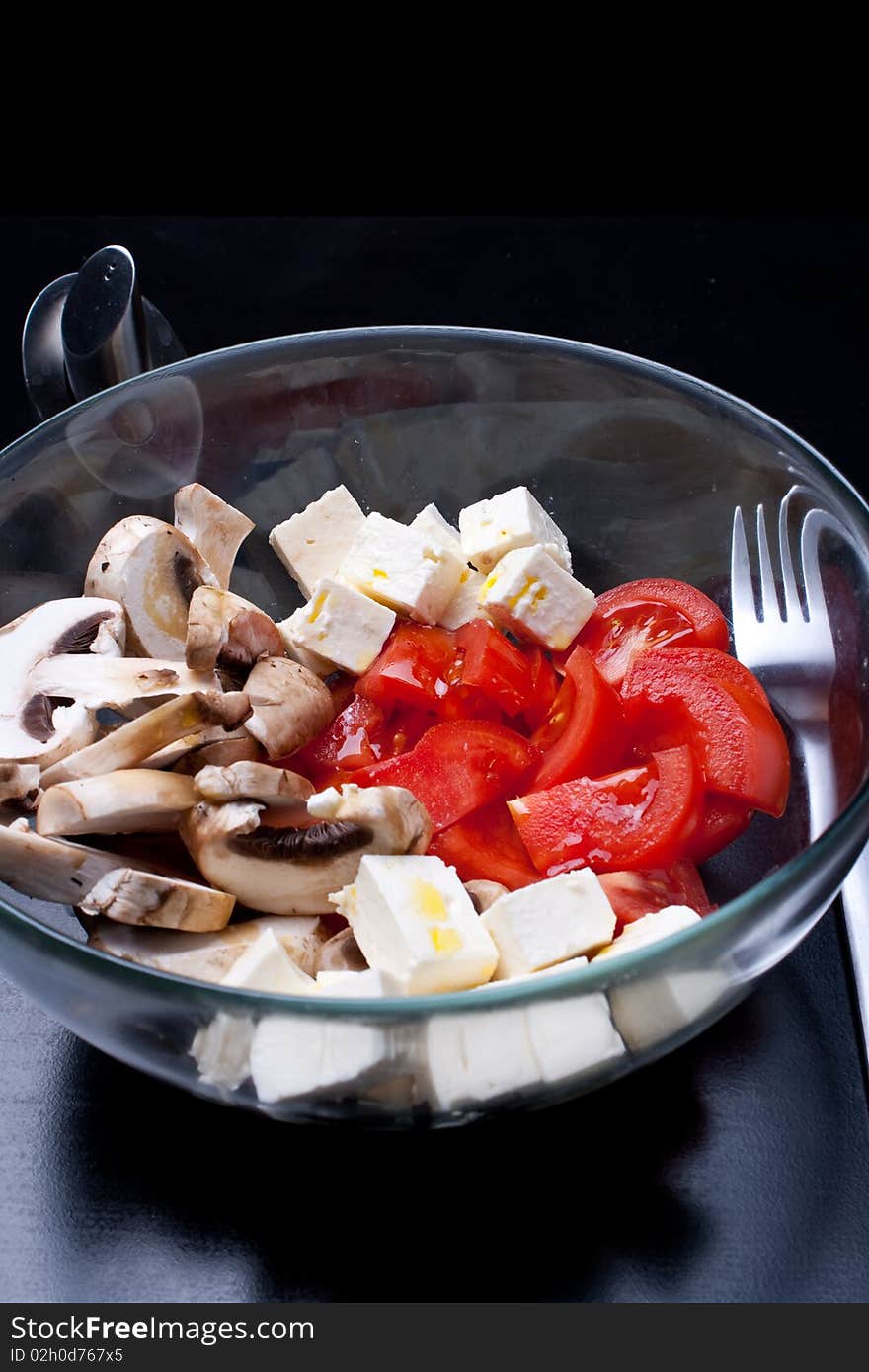 Italian salad with tomatoes, mushrooms and cheese